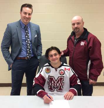 Evan Wells (centre) poses for a photo with Chatham Maroons head coach Kyle Makaric (left) and Maroons General Manager Kevin Fisher (right). (Contributed photo)