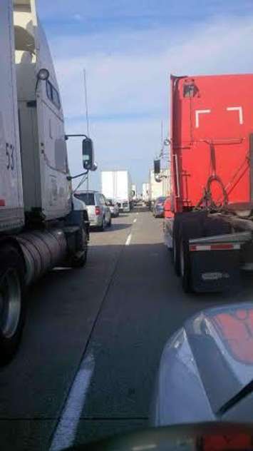 Traffic backed up in the eastbound lanes of Hwy. 401 near Tilbury, July 24, 2015. (Photo courtesy of Noah Katzman)