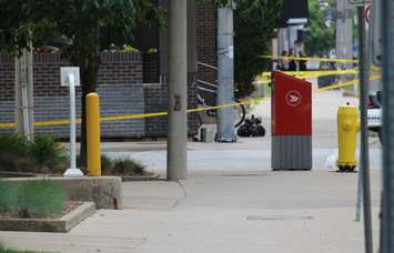 Windsor police investigate a suspicious package on the corner of Chatham St. and Goyeau St. downtown, June 17, 2015. (Photo by Mike Vlasveld)