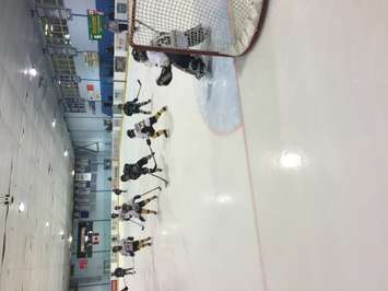 A Twin-Centre player takes a shot on Mitchell's goalie during their 4-3 loss in the Novice 