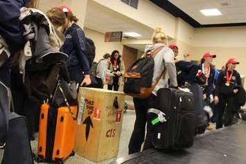 Windsor Lancers women's basketball team arrives at Windsor airport after winning their fifth-straight national championship. (Photo by Jason Viau)