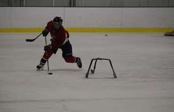 Students at the FJ Brennan Centre of Excellence & Innovation Hockey Canada Skills Academy take part in practice, March 5, 2015. (Photo by Mike Vlasveld)