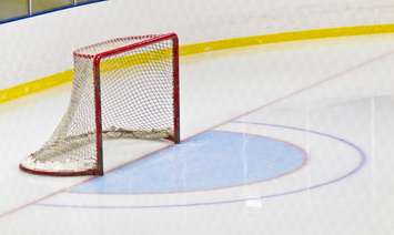 A hockey net on a rink. © Can Stock Photo / ClickImages