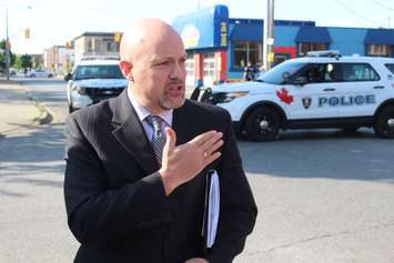 Staff Sgt. Matthew D'Asti speaks with the media about a gunman in the area of Pillette Rd., June 1, 2016. (Photo by Jason Viau)