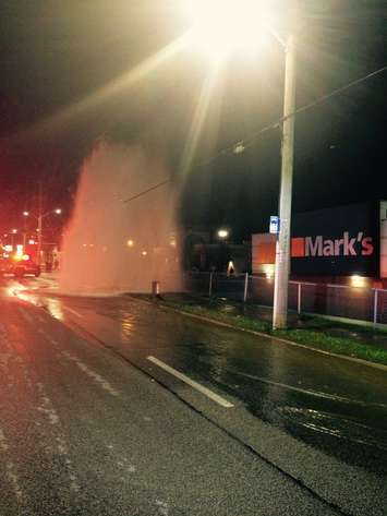 Emergency crews respond to Erie St. in Leamington after a vehicle collided with a fire hydrant, October 19, 2016. (Photo courtesy of the Leamington Fire Service) 