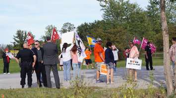 Protesters at Stephen Harper campaign rally at LamSar Sept. 20, 2015 (BlackburnNews.com photo by Dave Dentinger)