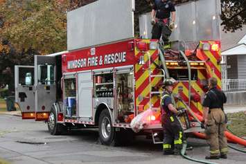 Windsor firefighters at the scene of a house explosion on Francois Rd., October 21, 2015.  (Photo by Adelle Loiselle)