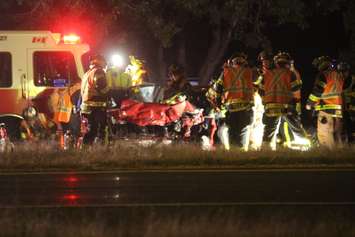 Emergency crews respond to a multi-vehicle crash on EC Row at Walker Rd., September 22, 2015. (Photo by Jason Viau)