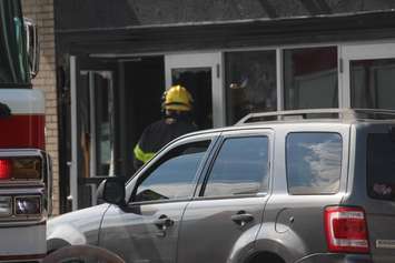 A Windsor firefighter checks the entrance of the Olde Walkerville Theatre, September 1, 2018. Photo by Mark Brown/Blackburn News.