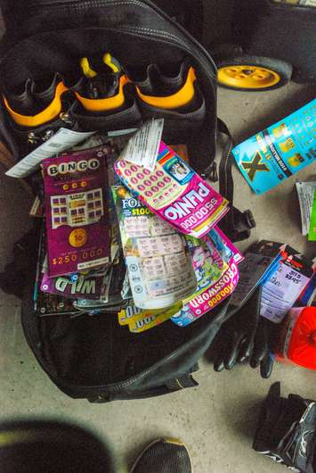 Stolen lottery tickets found by OPP during searches at three London homes. Photo submitted by the Ontario Provincial Police. 