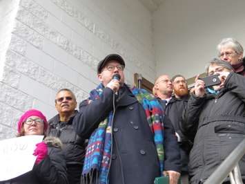 Rev. Kevin George of St. Aidan's Anglican Church speaks at a solidarity rally at the London Muslim Mosque, January 30, 2017. (Photo by Miranda Chant, Blackburn News.)