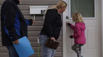 Liegha opens the door to her new Habitat for Humanity home, which she will share with her grandmother Anne LaForge. October 24, 2019 Photo by Melanie Irwin.