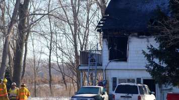The scene of a fatal fire off the St. Clair Parkway south of Courtright Jan. 28, 2015 (BlackburnNews.com photo by Dave Dentinger)
