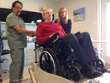 Dr. Larry Soden unveils new equipment to improve accessibility at his Colborne Rd. office. January 28, 2015 (BlackburnNews.com photo by Melanie Irwin)