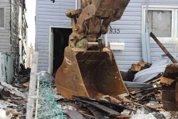 The scene of an intentionally set fire in the 800-block of Assumption St. in Windsor, March 4, 2015. (Photo by Mike Vlasveld)