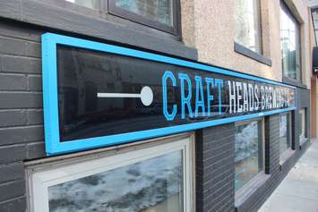 Craft Heads sign on Pelissier St. downtown Windsor, February 2015. (Photo by Mike Vlasveld)