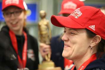 Windsor Lancers women's basketball head coach Chantal Vallee arrives at Windsor airport after winning a fifth-straight national championship. (Photo by Jason Viau)