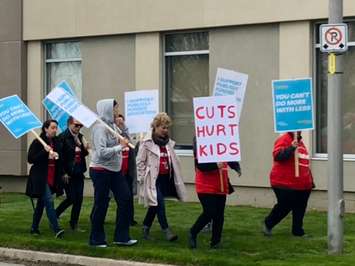 Dozens gather in Chatham on Tuesday, April 30, 2019 to rally against provincial funding cuts to education. (Photo by Allanah Wills) 