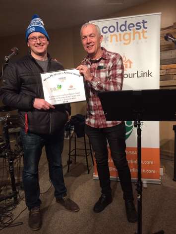 Lead Sponsor rep Hilco Tamminga of Truly Green Farms (left) and Andrew Hawkins of NeighbourLink. Saturday, February 23. (Photo submitted by Al Baker)
