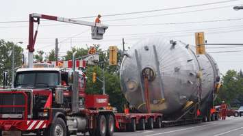 A large refinery vessel turns left on Exmouth from Murphy Rd. Has to make it through the width of the traffic lights. July 17, 2015 (BlackburnNews.com Photo by Briana Carnegie)