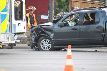 Emergency crews respond to a crash at the intersection of Huron Church Rd. and Tecumseh Rd. W, July 21, 2015. (Photo by Jason Viau)