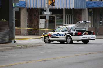 Windsor police investigate a suspicious package on the corner of Chatham St. and Goyeau St. downtown, June 17, 2015. (Photo by Mike Vlasveld)
