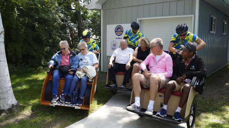 A test ride of the trishaws. August 18, 2023. (Photo by Natalia Vega)