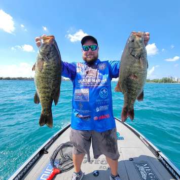 Kyle Nead shows off a pair of fish at the Great Lakes Super Series at Sarnia Bay.  6 August 2022. (Photo by Great Lakes Super Series)