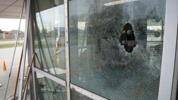 A smashed window at St. Patrick's Catholic High School in Sarnia. 5 November 2020. (BlackburnNews.com photo by Colin Gowdy)