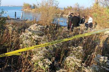 Windsor police investigate after a dead body was found in the Detroit River, November 11, 2015. (Photo by Jason Viau)