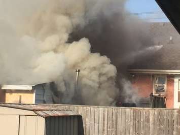 Firefighters respond to a garage fire on Indian Rd. in Sarnia, May 26, 2016. (Photo courtesy of Aaron Zimmer)