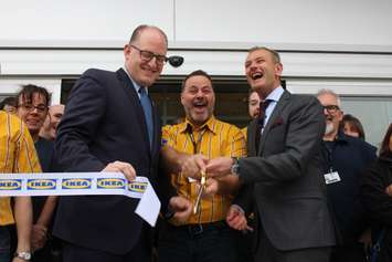 Windsor Mayor Drew Dilkens, left, IKEA Windsor's store manager and IKEA Canada President Stefan Sjostrand perform the ribbon cutting, April 4, 2016. (Photo by Jason Viau)
