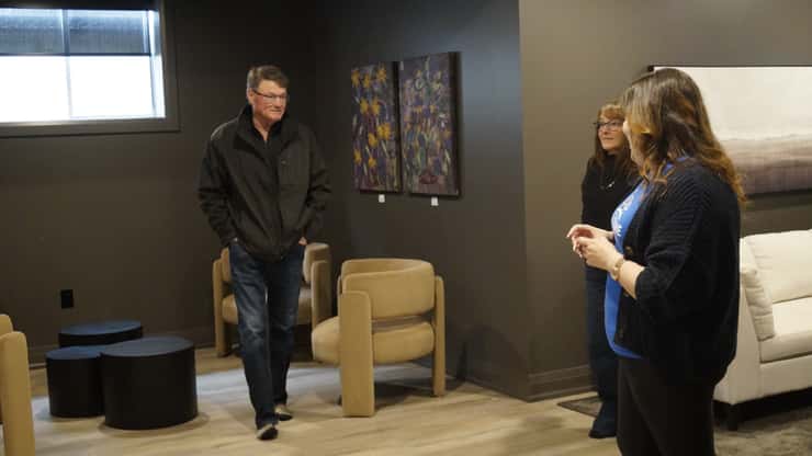 Sharon and Jim Jardine tour the basement. February 20, 2025. (Photo by Natalia Vega)