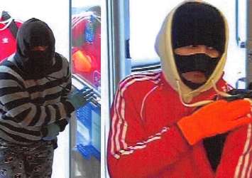 Surveillance images of two  suspects wanted in relation to the RBC bank robbery in Embro, March 29, 2018. Photo courtesy of OPP.