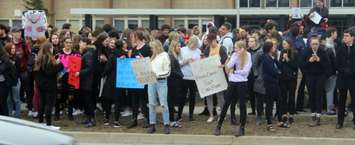 Students walk out of class at Chatham-Kent Secondary in protest of changes being made to education by the Ford government. April 4, 2019. (Photo by Greg Higgins)