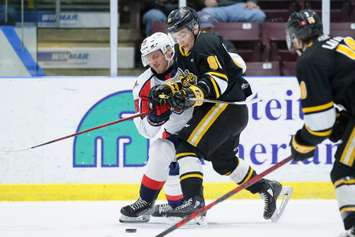 The Sarnia Sting battling the Windsor Spitfires in Game 4 of a first round playoff series.  April 29, 2022 (Metcalfe Photography)