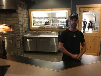 A look into the open kitchen in Cowbell, with a full pizza oven. August 3rd, 2017 (Photo by Ryan Drury)
