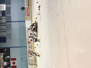 Mitchell celebrate their 4-3 Novice 