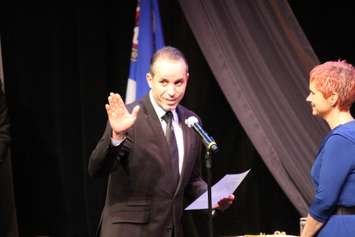 Bill Marra is set to read his oath of office, as Windsor Council holds its inaugural meeting, December 1, 2014. (photo by Mike Vlasveld)
