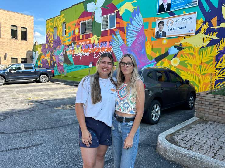 Artists of a new downtown Sarnia mural Kennady Osborne and Taryn Henry (Photo by: Lindsay Newman/ Blackburn Media) 