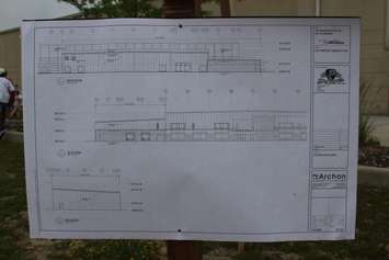 Blue prints for a new community pool, being built onto the WFCU Centre in Windsor are displayed at its ground breaking ceremony, July 7, 2015. (Photo by Mike Vlasveld)