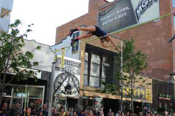 Athletes compete in a pole vaulting competition on Ouellette Ave., May 22, 2015. (Photo by Jason Viau)