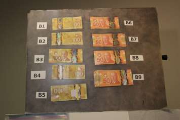 Cash seized in a recent drug investigation, May 30, 2017. (Photo by Mike Vlasveld)