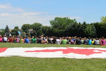 Gregory Drive Public School students await the arrival of the Canadian Snowbirds, June 21, 2016 (Photo by Jake Kislinsky)