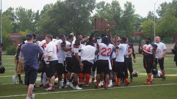 The All Stars receive the NFC Championship Trophy (photo by Jake Jeffrey blackburnnews.com)