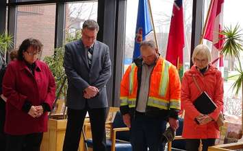 A moment of silence during the 2014 National Day of Mourning ceremony in Chatham-Kent.  (Photo by Ashton Patis)