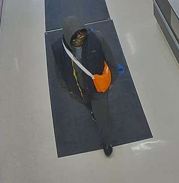 Police said they are asking for the public's help to identify the woman pictured below in connection with the an assault that took place at approximately 8:30 a.m. on Monday, February 13, 2023. (Photo courtesy of Chatham-Kent police)