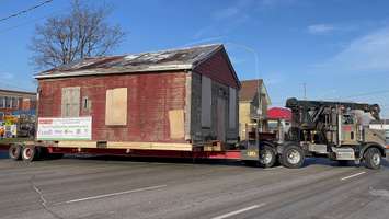 The Fugitive Slave Chapel on a flatbed truck on its way to the Fanshawe Pioneer Village. November 22, 2022. Photo submitted by Lisa Timpany. 