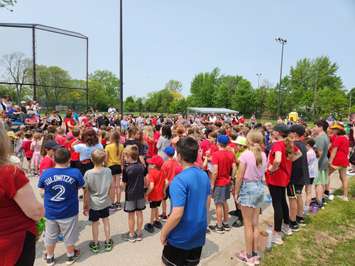 A crowd gathers at St. George's Square in Corunna for a rededication ceremony (Blackburn Media Photo by Josh Boyce)