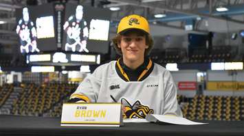 Sarnia Sting 2023 first round pick Ryan Brown signs an OHL Standard Player Agreement. May 2023. (Photo by Sarnia Sting)
